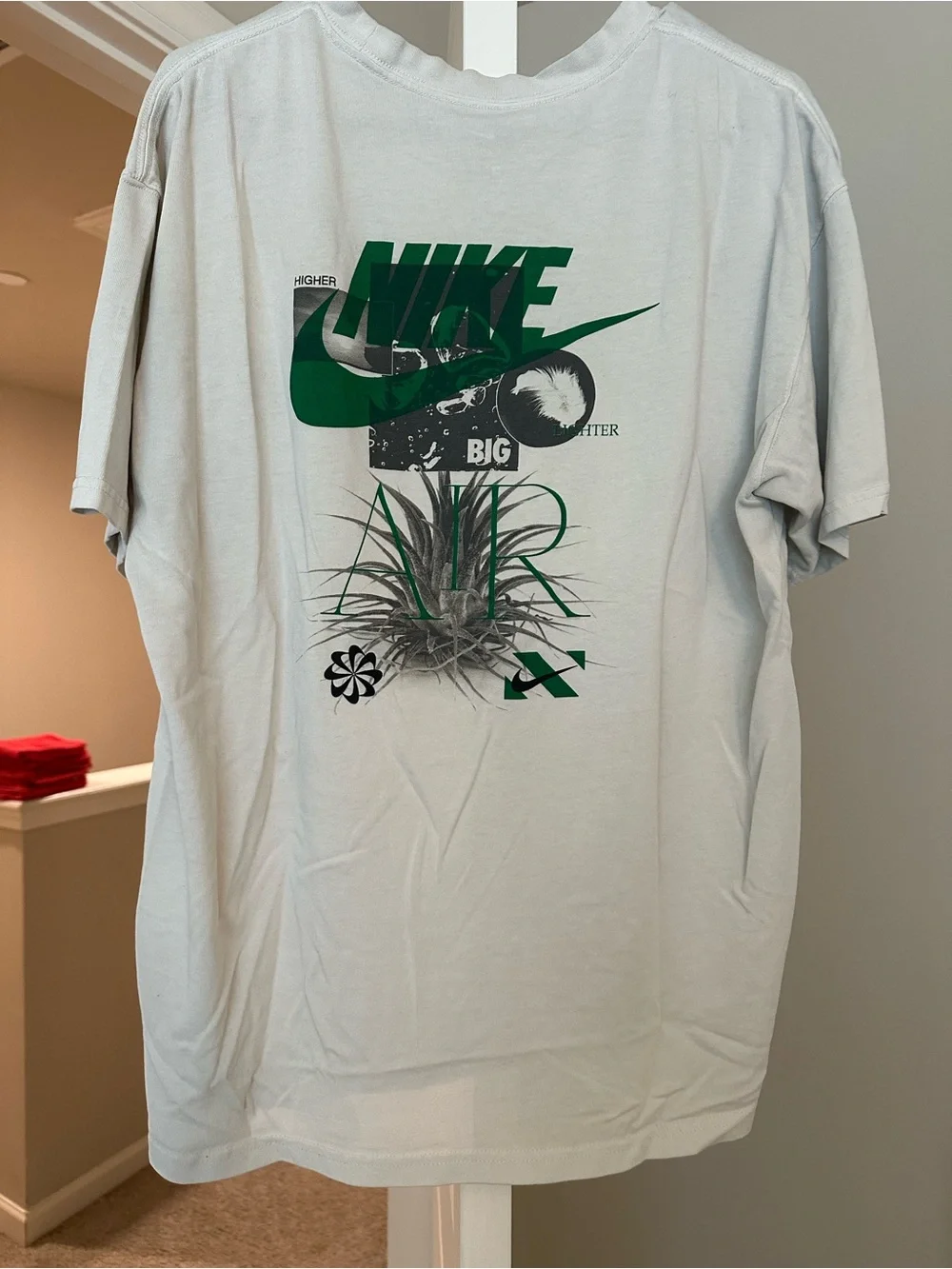 Nike Men’s White Short Sleeve Tee with Green Logo